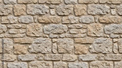 Rustic tan stone wall texture background for natural branding and traditional architectural wallpaper with professional urban backdrop design and masonry surface pattern hd res