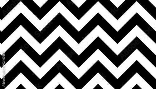 A stark black and white geometric pattern of sharp zig-zag lines creates a bold and graphic visual background.