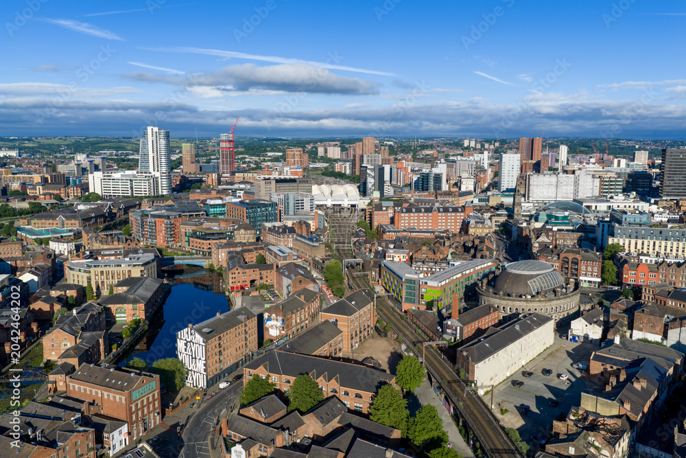 Fototapeta premium Leeds city centre, West Yorkshire, England, viewed from the east across the River Aire. Aerial view of the skyline, commercial districts and modern urban development.