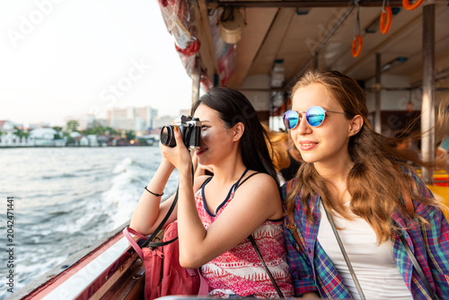 Photos Friends enjoying riverboat adventure photo