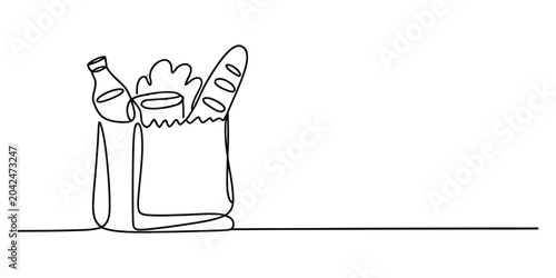Fotografie Continuous line drawing of a grocery shopping bag with bread and a bottle