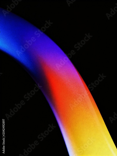 Abstract colorful arc with blue purple orange and yellow gradient on black background, grainy texture, banner, backdrop design