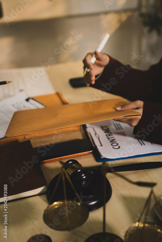 Lawsuit and justice concept, Lawyer  working with partner at law firm. legal consulting discussion defendant punishment law in courtroom