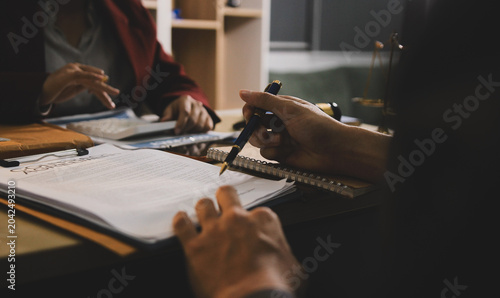 Lawsuit and justice concept, Lawyer  working with partner at law firm. legal consulting discussion defendant punishment law in courtroom