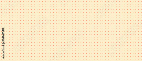 Obraz na płótnie Dot pattern background in soft peach tone with repeating elements