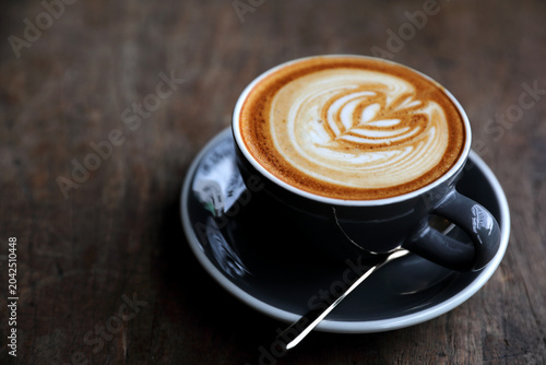 Foto TAZA DE CAFÉ Y GRANO DE CAFÉ