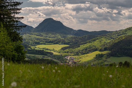 Bild auf Leinwand Green fresh spring landscape blue sky hot day Strazovske mountains and Sulov