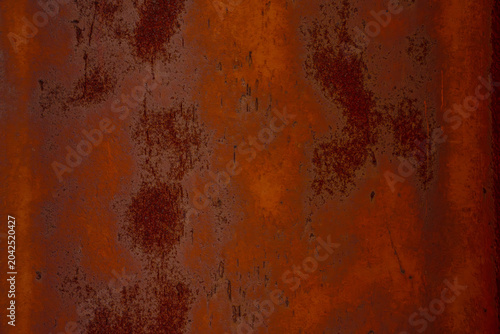 Rusty metal surface showing detailed texture and patterns of natural corrosion
