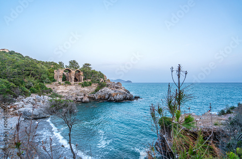 The scenic views of Aytap (iotape) is popular for camping, swimming in the natural caves, the local beaches, and the ancient ruins, located east of Alanya, in the Mediterranean Region, Turkey. 