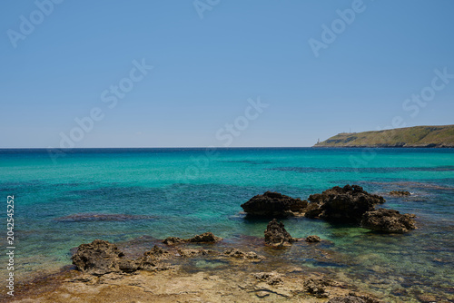 Coast in Puglia southern italy with turquoise sea and blue sky in summer