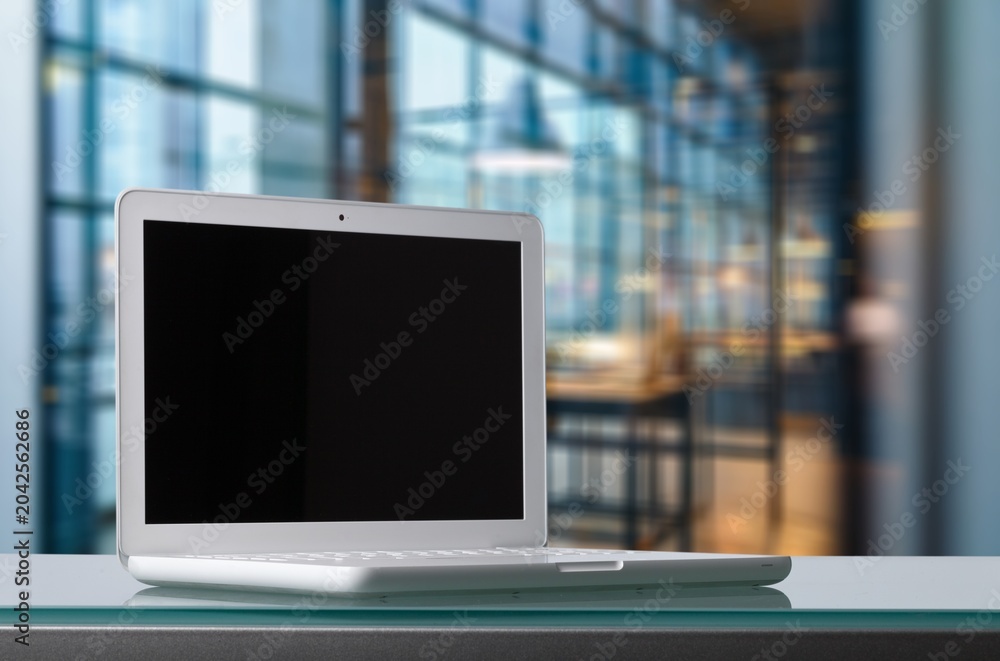 Fototapeta premium Office workplace with modern laptop computer