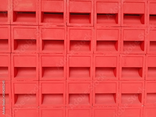 Foto Red terracotta ventilation brick wall background