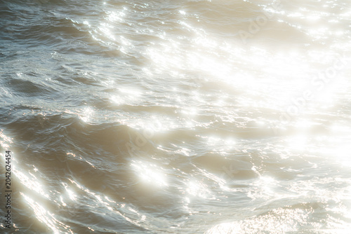  Sunlight reflecting on gentle sea waves