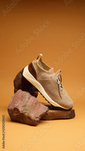 Beige Knit Sneakers on Rock