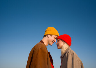 Young Couple Share a Moment Under a Clear Sky