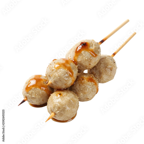 Delicious grilled meatballs on skewers drizzled with a sweet and savory sauce, perfect for a satisfying snack or appetizer