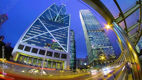 Skyscrapers with traffic car light trail timelapse. Hong Kong. Beautiful vibrant city vibe.