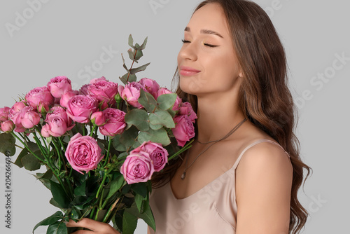 Beautiful young woman with ...