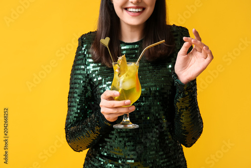 Young woman with glass of t...