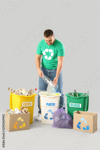 Male volunteer with recycle...