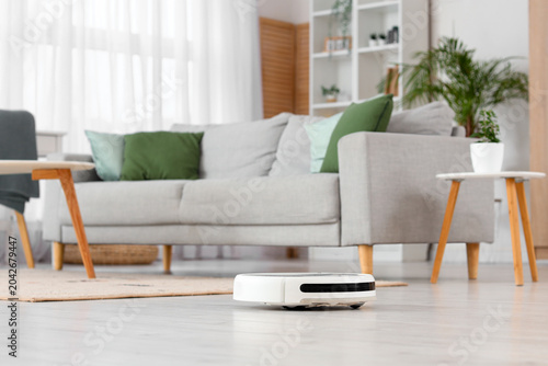 Robot vacuum cleaner on flo...