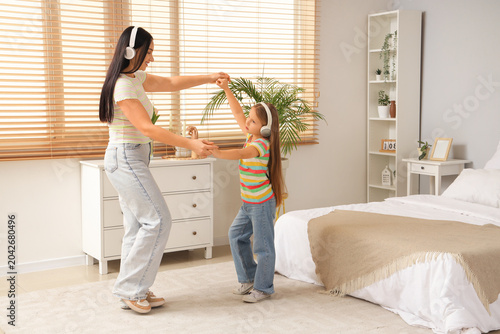 Happy mother with her littl...