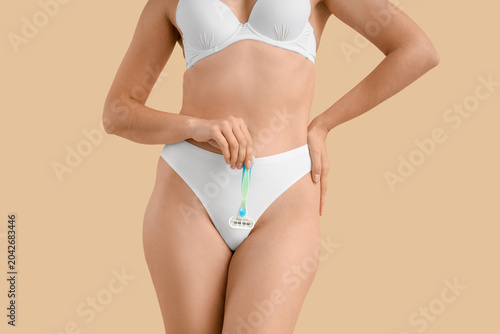 Beautiful young woman with ...