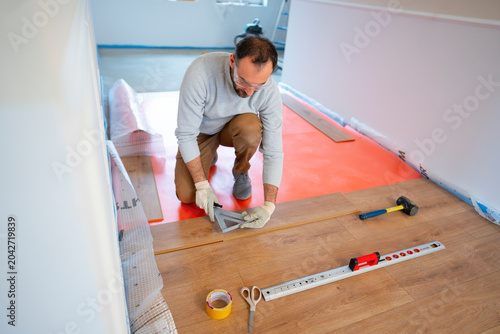 A man is working on a home renovation