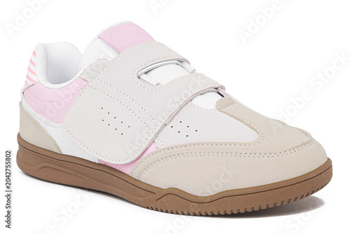 Casual shoes in a combination of cream and pink without laces with brown soles isolated on a white background