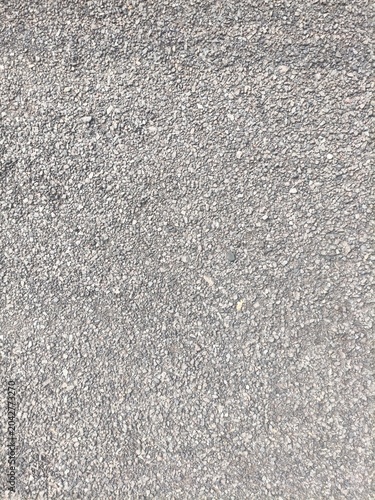 Close-up of gray gravel road surface