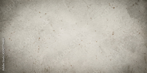 Foto A textured, distressed, aged paper surface with subtle grunge elements and a vintage feel