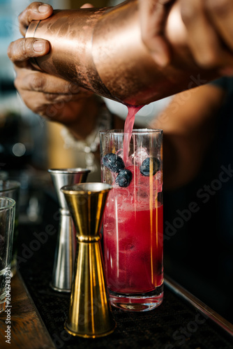 Pouring a shaken cocktail