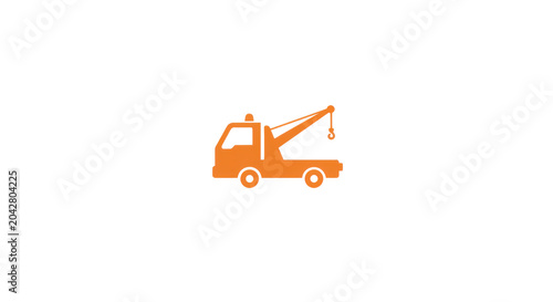 Tow truck in action assisting a stranded vehicle on a busy urban street