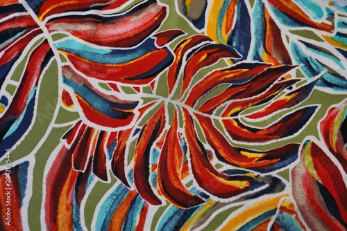 Colorful tropical leaf pattern fabric print abstract background