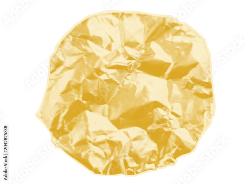A crumpled piece of gold foil or paper.. A round, shiny, wrinkled element for a collage. Crushed material with jagged edges for scrapbooking. A golden scrap of a cut out sticker in a halftone vintage 