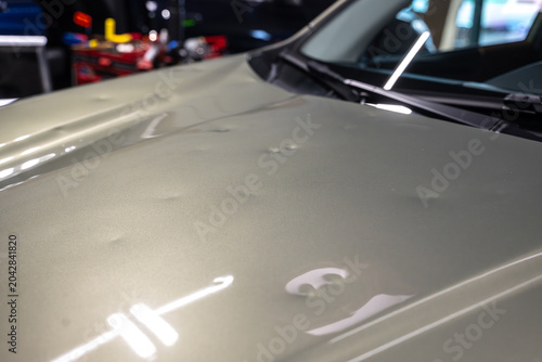 Car with dent in to Preparing process of Repairing Hail Damage in car body shop