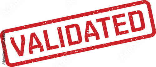 Fotografie A distressed red rubber stamp impression clearly displaying the word VALIDATED d