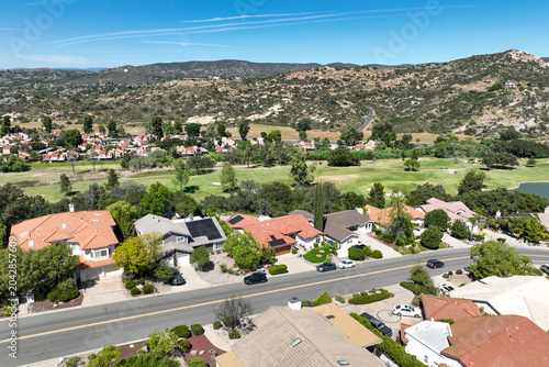 Принти на полотні Aerial view of Ramona neighborhood with mountain, valley and San Vicente Golf Co