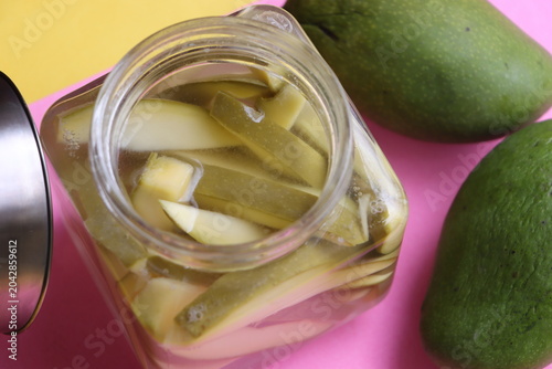 Authentic Green Mango in Salted Brine, Pickled Slices, Traditional Indian Uppilittathu or Kadumango