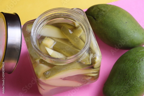 Authentic Green Mango in Salted Brine, Pickled Slices, Traditional Indian Uppilittathu or Kadumango