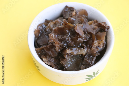 Edible jelly ear mushrooms. Fresh wood ear mushrooms in a bowl, ingredient for Asian cuisine
