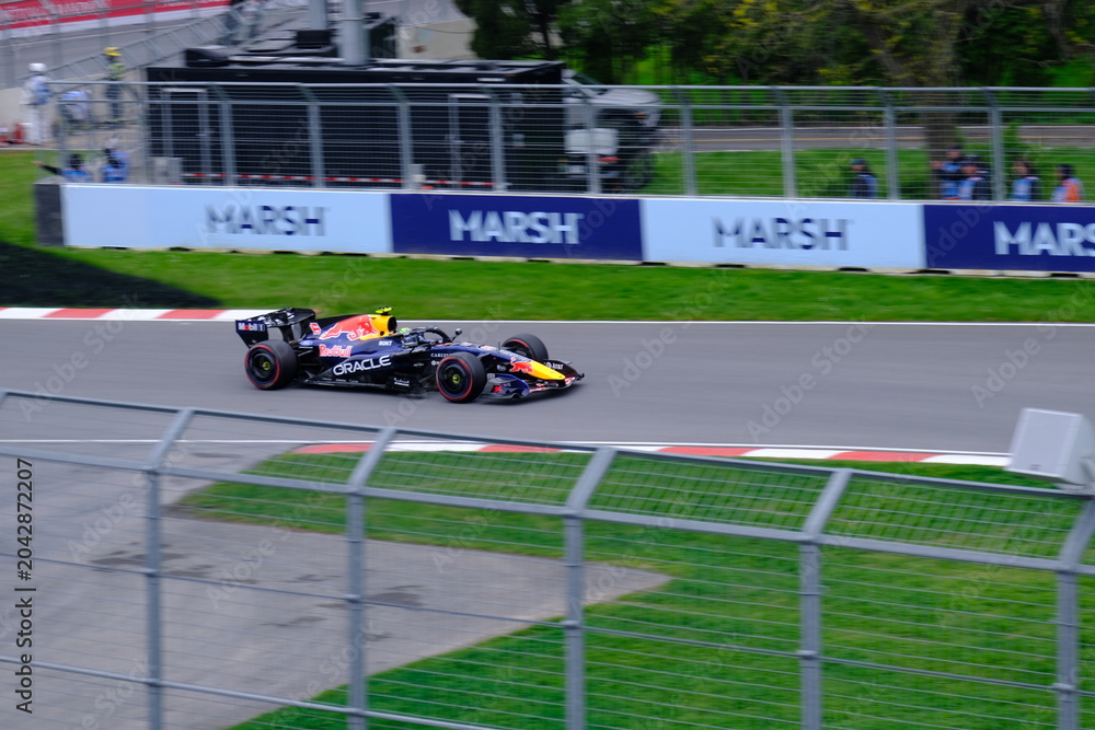 Obraz premium May 24, 2025, Montreal, Canada: Red Bull Racing Formula 1 car during by Hadjar or Verstappen, demonstration run at Circuit Gilles Villeneuve. g.