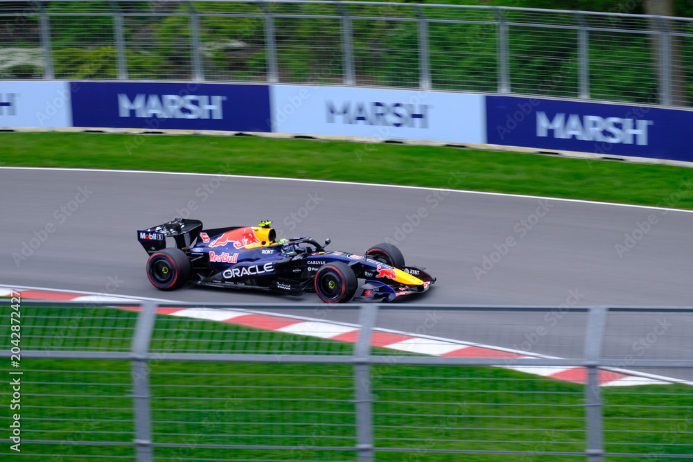 Naklejka premium May 24, 2025, Montreal, Canada: Red Bull Racing Formula 1 car during by Hadjar or Verstappen, demonstration run at Circuit Gilles Villeneuve. g.