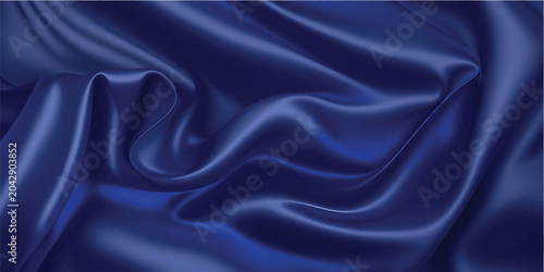 Fotografie Deep blue satin fabric draped in soft folds