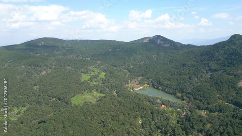 Aerial View of Karagol Lake Surrounded by Dense Green Pine Forest in Izmir Turkey. High quality 4k footage