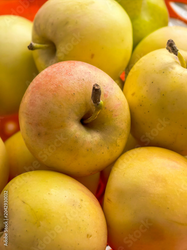 Ripe Yellow Apples In Basket Harvest Background