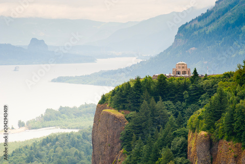 Cinematic Sunrise View of Vista House Over Columbia River Gorge with Morning Fog
