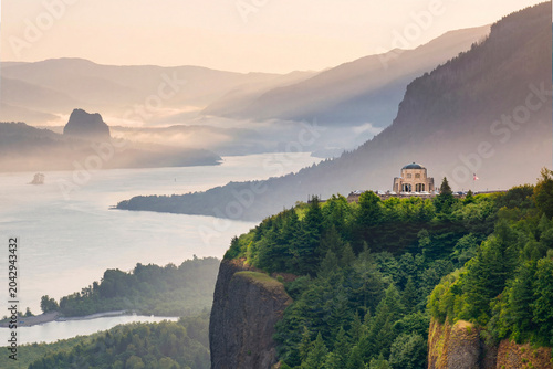 Cinematic Sunrise View of Vista House Over Columbia River Gorge with Morning Fog