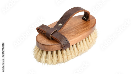 Фотография Equestrian horse grooming brush with wooden back and stiff bristles isolated on