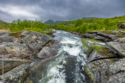 Bilde på lerret Wild Mountain River Flowing Through Rocky Scandinavian Landscape